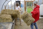 Vincent helps Debra with the early morning set-up chores.