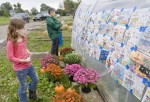 A greenhouse wall was transformed into a mural by the coloring contest.