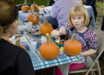 Painting pumpkins.