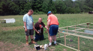 Logan, Adam and Shawn build a new chicken tractor